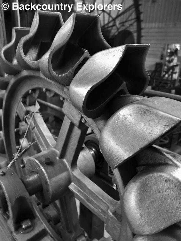 Black and white photo of pelton wheel