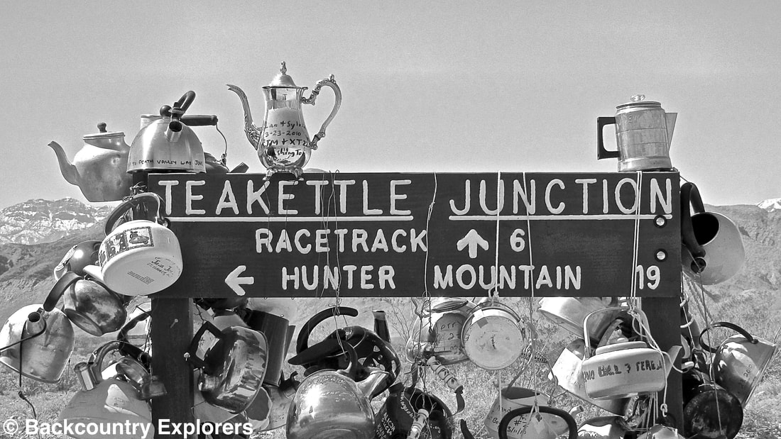Teakettle sign in black and white